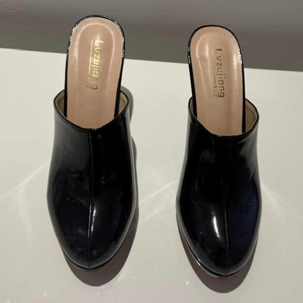 Platform clog mules, Black patent finish.